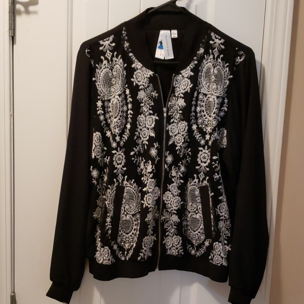 Black and tan bomber jacket